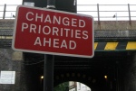 Sign - Changed Priorities Ahead