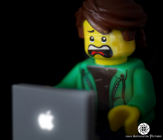 Lego man reading online